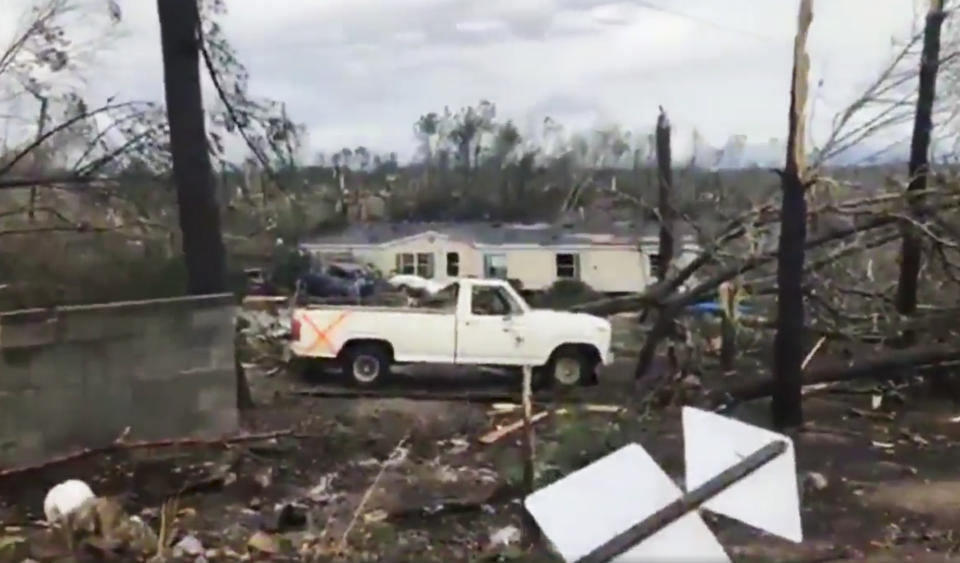 This photo shows debris in Lee County, Ala., after what appeared to be a tornado struck in the area, March 3, 2019. Severe storms destroyed mobile homes, snapped trees and left a trail of destruction amid weather warnings extending into Georgia, Florida and South Carolina, authorities said. (Photo: WKRG-TV via AP)