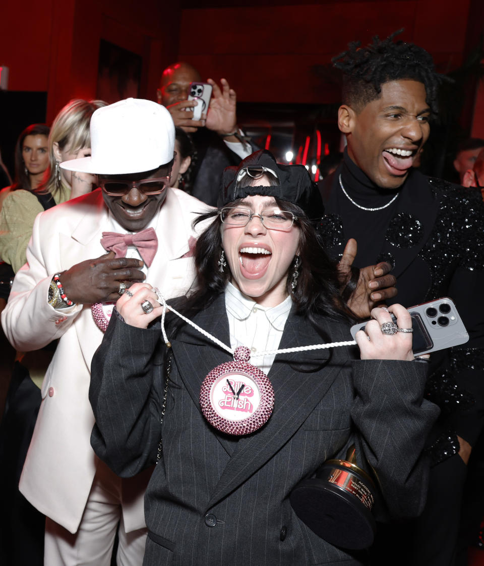 BEVERLY HILLS, CALIFORNIA - MARCH 10: EXCLUSIVE ACCESS, SPECIAL RATES APPLY. (L-R) Flavor Flav, Billie Eilish, and Jon Batiste attend the 2024 Vanity Fair Oscar Party Hosted By Radhika Jones at Wallis Annenberg Center for the Performing Arts on March 10, 2024 in Beverly Hills, California. (Photo by Stefanie Keenan/VF24/WireImage for Vanity Fair )