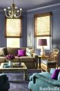 <p>Both the walls and ceiling of this room by Angie Hranowsky feature amethyst paint. Brighter pops of purple on the sofa and the <a href="http://www.christopherspitzmiller.com/" rel="nofollow noopener" target="_blank" data-ylk="slk:Christopher Spitzmiller" class="link ">Christopher Spitzmiller </a>lamp give it a little contrast, so it doesn't feel too muted. </p>