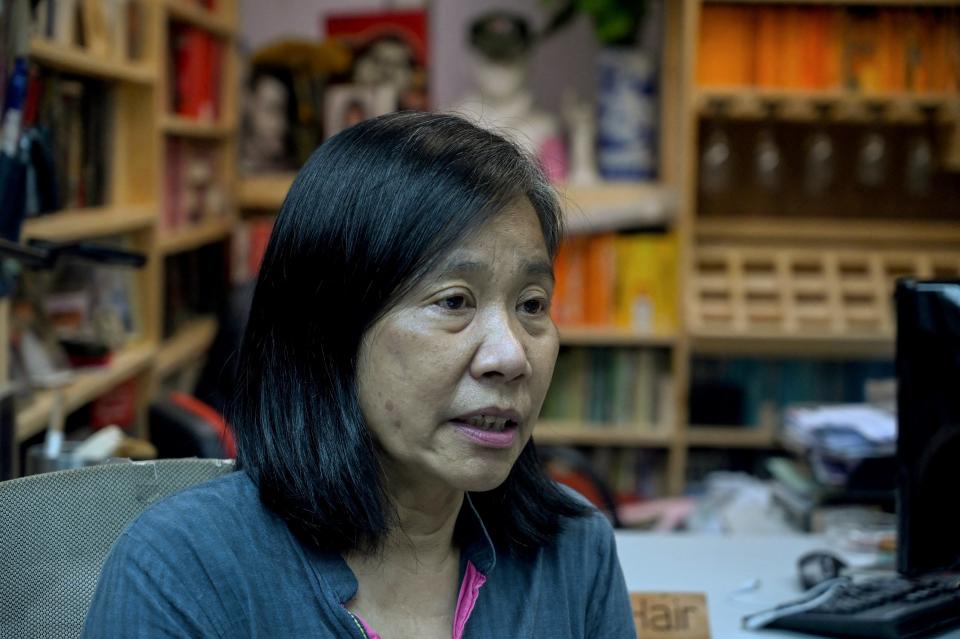 This photo taken on April 12, 2021 shows veteran pro-democracy activist Chan Po-ying talking to AFP in her office in Hong Kong which she shares with her jailed husband Leung Kwok-hung, better known by his sobriquet 