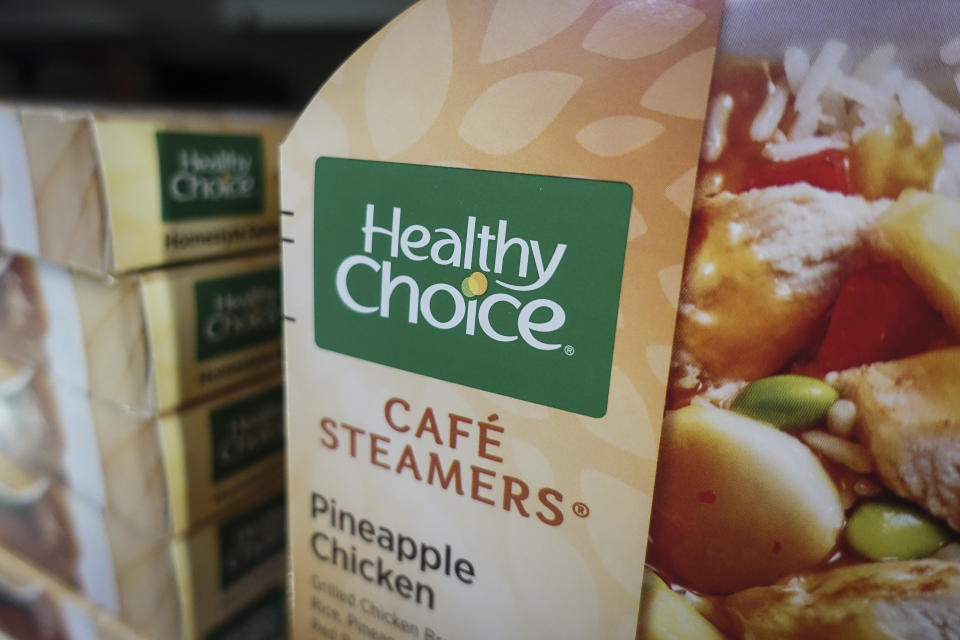 Frozen dinners by Healthy Choice, a Conagra brand, rest on a supermarket shelf, Tuesday, June 25, 2019, in Cincinnati. (AP Photo/John Minchillo)