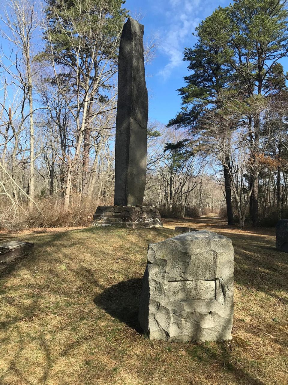 The Great Swamp Fight Monument, at the northern tip of the Great Swamp Management Area, stands on a mound at the center of a circular clearing.