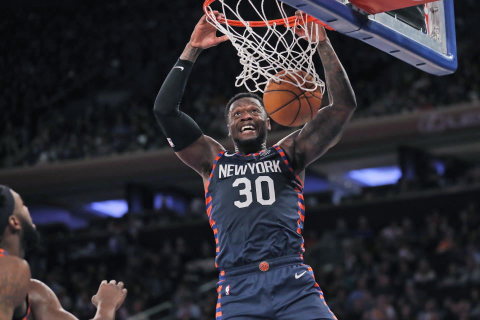 New York Knicks' Julius Randle dunks the ball during the second half of the NBA basketball game against the Miami Heat, Sunday, Jan. 12, 2020, in New York. The Knicks defeated the Heat 124-121. (AP Photo/Seth Wenig)