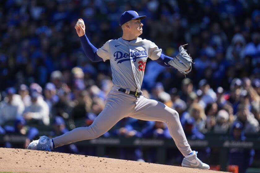 Los Angeles Dodgers pitcher Bobby Miller throws against the Chicago Cubs during the first inning of a baseball game Friday, April 5, 2024, in Chicago. (AP Photo/Erin Hooley)