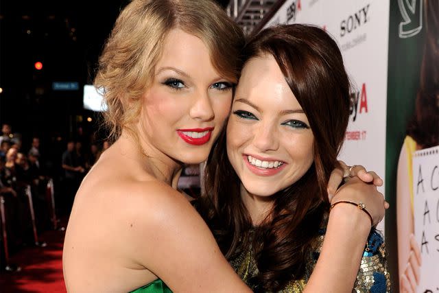 Kevin Winter/Getty Images Taylor Swift and Emma Stone