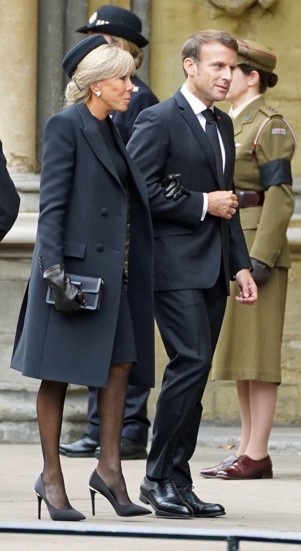 French President Emanuel Macron and wife Brigitte Trogneux (James Manning/PA)