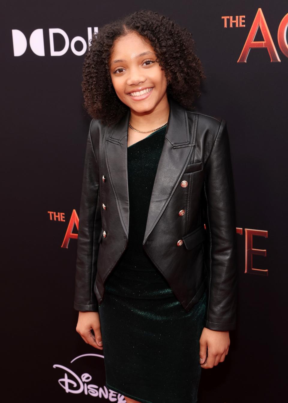 Leah Brady wearing a leather jacket and dark dress at the Hollywood premiere of "Star Wars: The Acolyte"