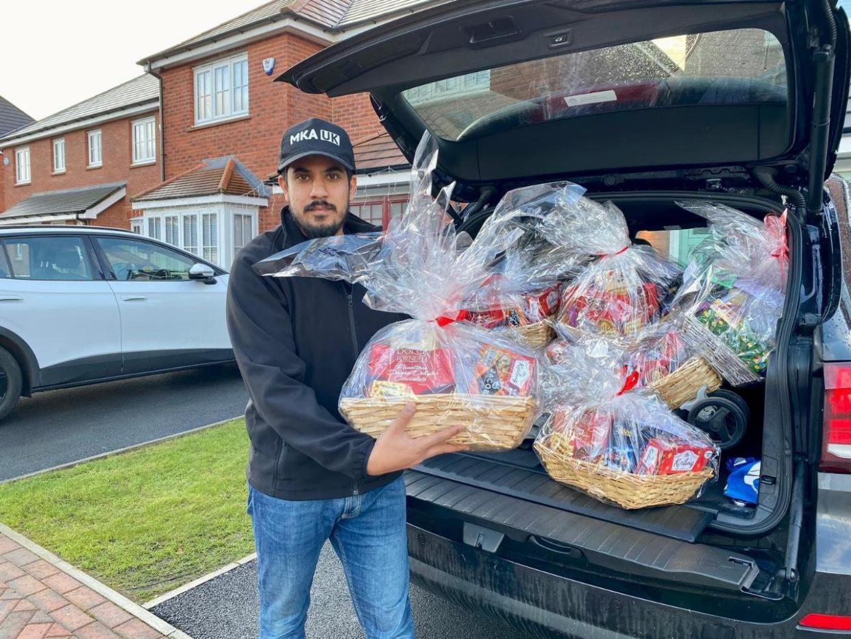 The gift baskets contained a selection of items such as chocolates, festive food, scented candles, a winter scarf, toys, stationery and a card (Amya/PA)