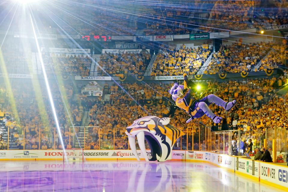 <p>Predators mascot Gnash hangs out before puck drop. (Frederick Breedon/Getty) </p>