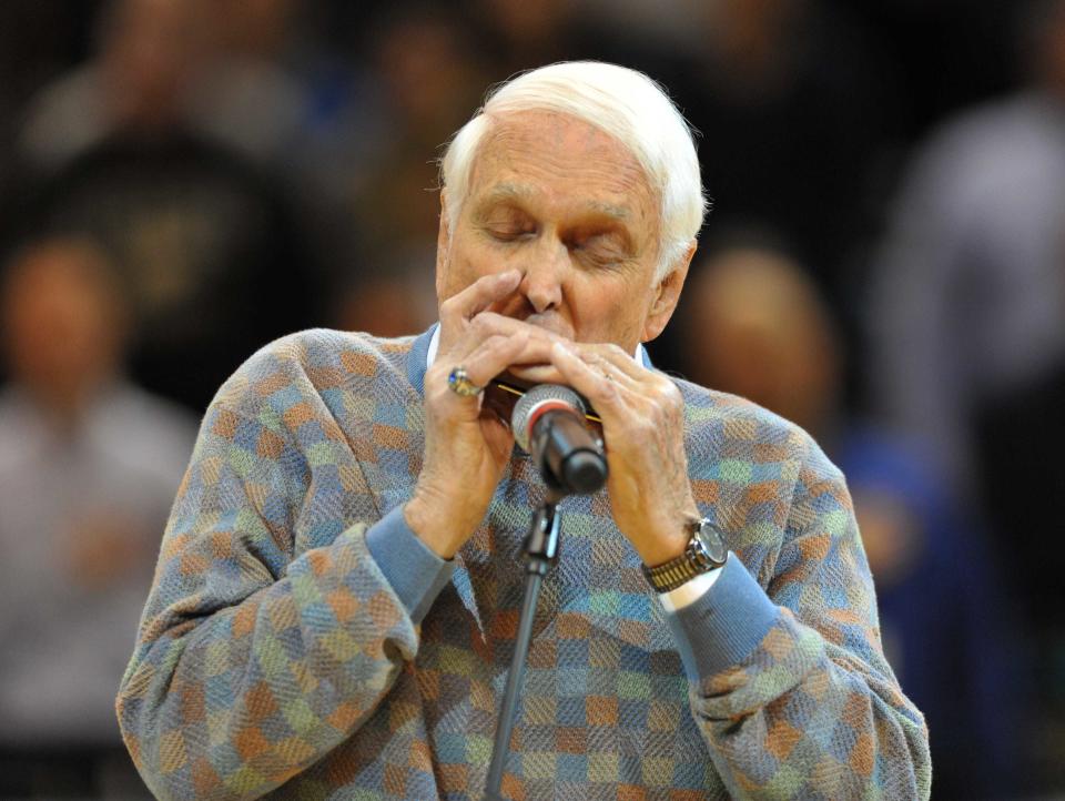 Former MLB Brooklyn Dodger Carl Erskine played the National Anthem on his harmonica before the start of the Pacers-Nets game at Bankers Life Fieldhouse on Feb. 11, 2013.