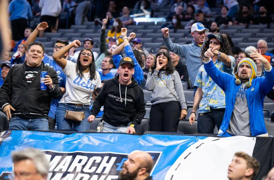 UCLA Bruins fans cheer as their team plays against the UNC Asheville Bulldogs during the second half of the NCAA Tournament game at Golden 1 Center on Thursday.