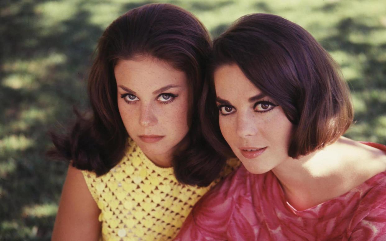 The death of Natalie Wood is one of Hollywood's darkest mysteries: pictured here with her sister Lana - Getty