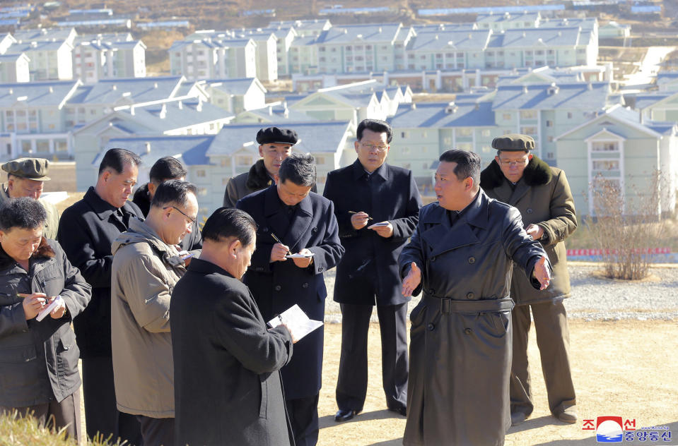 This undated photo provided on Nov. 16, 2021, by the North Korean government, North Korean leader Kim Jong Un, front right, inspects the construction site of Samjiyon city development project in Ryanggang province, North Korea. Independent journalists were not given access to cover the event depicted in this image distributed by the North Korean government. The content of this image is as provided and cannot be independently verified. Korean language watermark on image as provided by source reads: "KCNA" which is the abbreviation for Korean Central News Agency. (Korean Central News Agency/Korea News Service via AP)