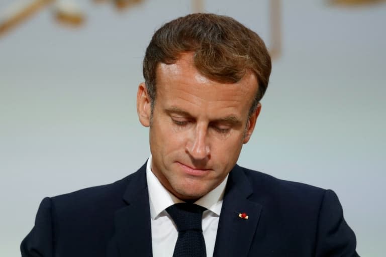 Le président français Emmanuel Macron lors d'une cérémonie en mémoire des harkis, au palais de l'Elysée, le 20 septembre 2021 - GONZALO FUENTES © 2019 AFP