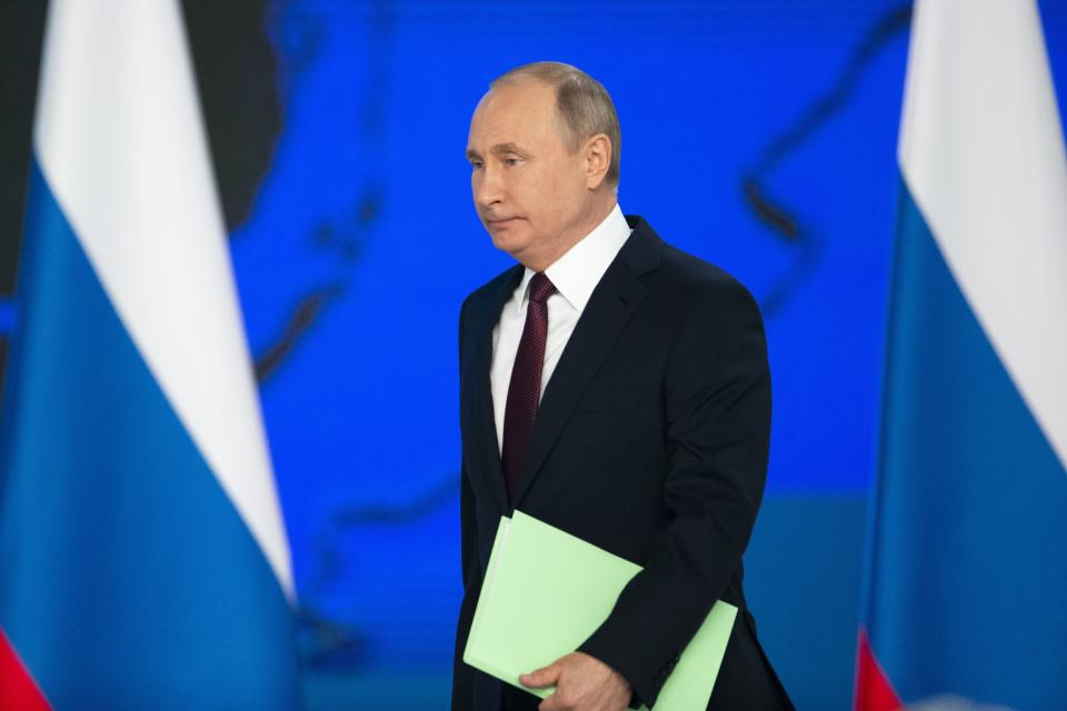 Russian President Vladimir Putin arrives to deliver a state-of-the-nation address in Moscow, Russia, Wednesday, Feb. 20, 2019. Putin sternly warned the United States against deploying new missiles in Europe, saying that Russia will retaliate by fielding new weapons that will take just as little time to reach their targets. (AP Photo/Alexander Zemlianichenko)