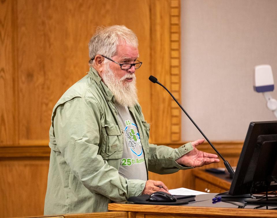 Tom Palmer representing the Sierra Club protests a proposed housing development off Hatchineha Road during a Polk planning commission hearing to deliberate on the fate of 1,876 homes for the Creek Ranch development in the County Commission chamber in Bartow Fl. Tuesday August 2,2023.Ernst Peters/The Ledger