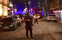 <p>An armed policeman stands on Borough High Street as police are dealing with an incident on London Bridge in London, Saturday, June 3, 2017. Witnesses reported a vehicle hitting pedestrians and injured people on the ground. (Dominic Lipinski/PA via AP) </p>