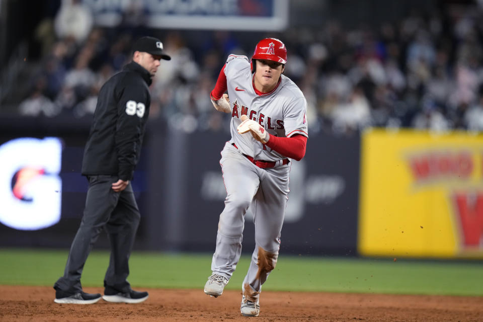 Los Angeles Angels' Shohei Ohtani, of Japan, advances to third base after stealing second against the New York Yankees during the fifth inning of a baseball game Tuesday, April 18, 2023, in New York. (AP Photo/Frank Franklin II)