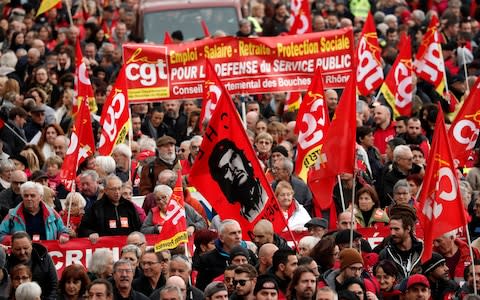 Unions representing railway and transport workers and many others in the public sector have called for a general strike - Credit: &nbsp;GUILLAUME HORCAJUELO/EPA-EFE/REX