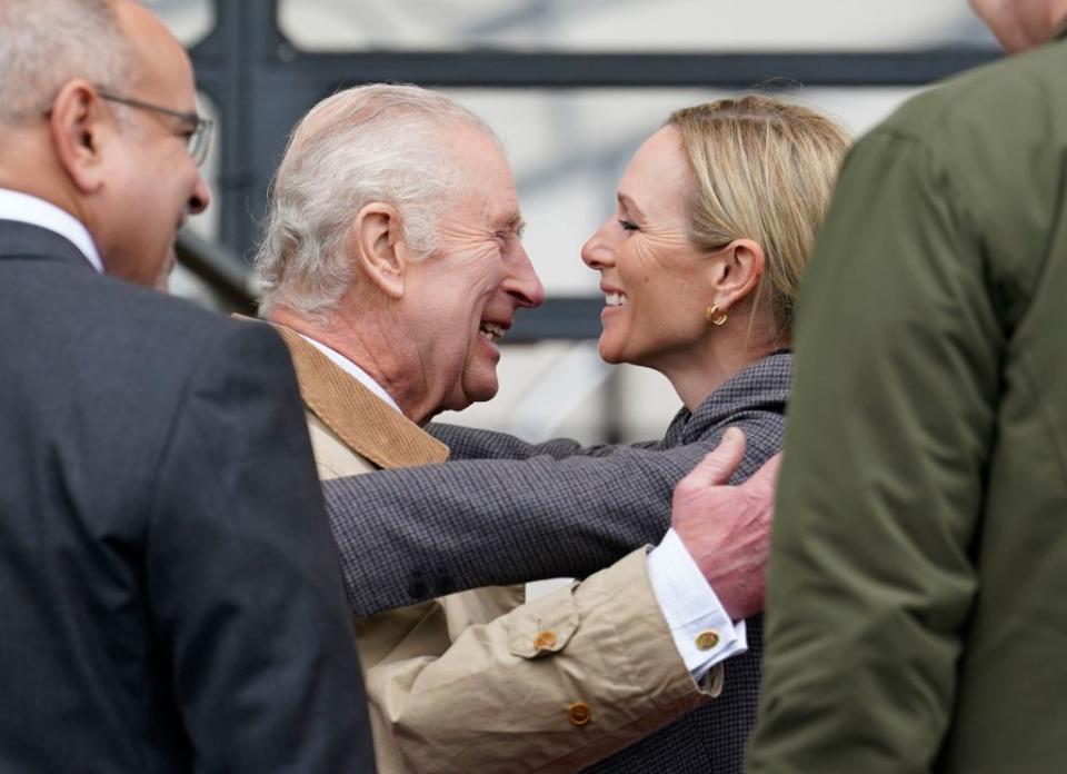 King Charles III and Zara Tindall greet each other amidst his cancer diagnosis. AP