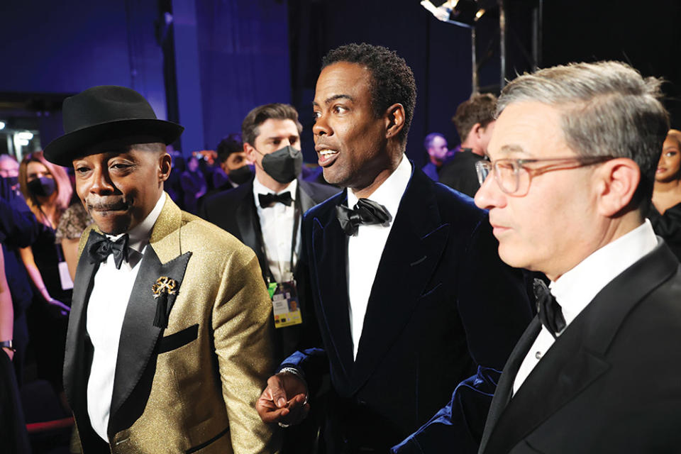 Packer and Chris Rock backstage at the fateful 2022 Oscars, which Packer produced and where Will Smith slapped presenter Rock on live TV.