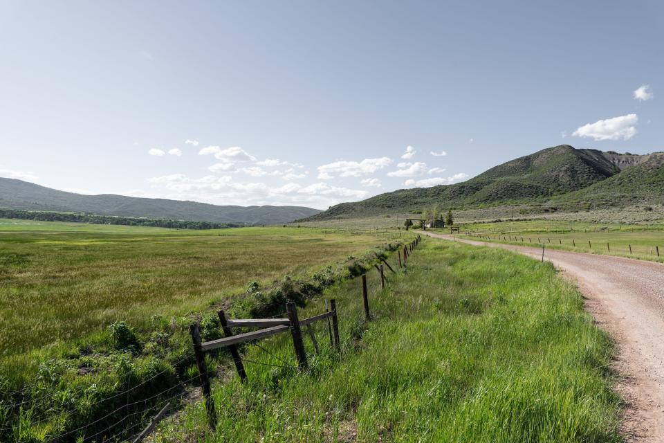 A wide green valley in Colorado.