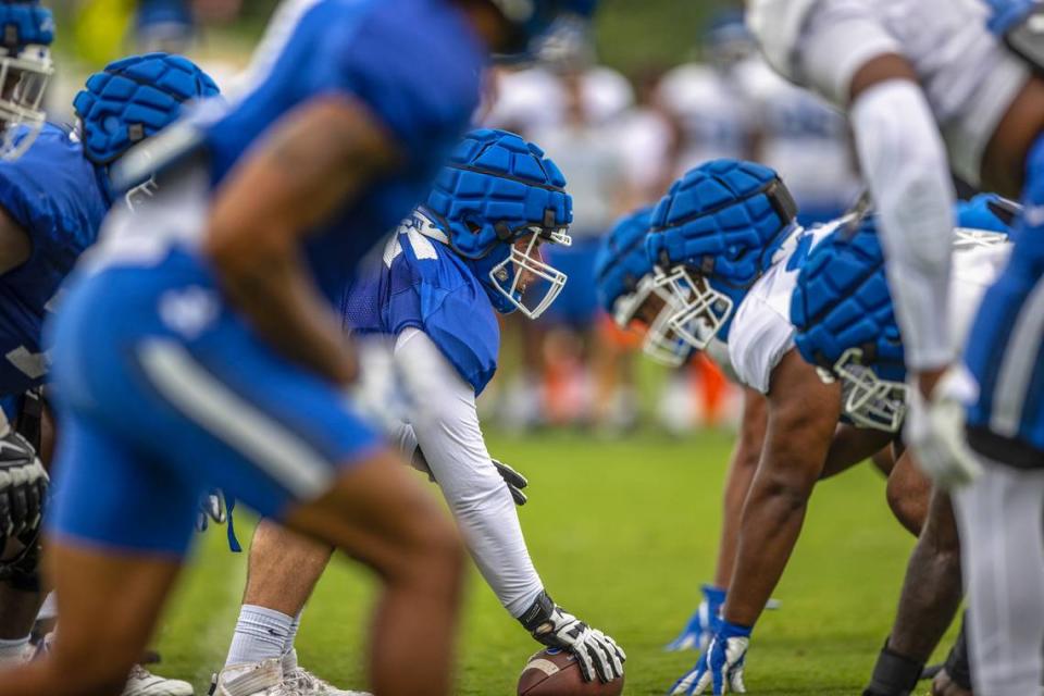 Kentucky’s linemen squared off in the trenches during Saturday’s open practice at the Joe Craft Football Training Center practice fields on Fan Day at UK.