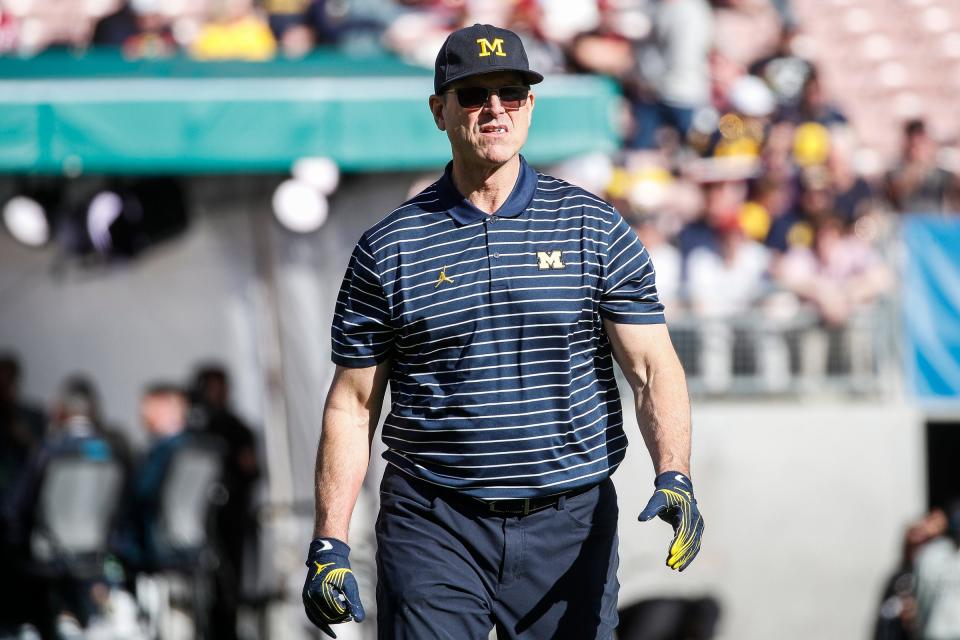 Michigan head coach Jim Harbaugh watches warmups ahead of the Rose Bowl game against Alabama at Rose Bowl Stadium in Pasadena, Calif., on Monday, Jan. 1, 2024.