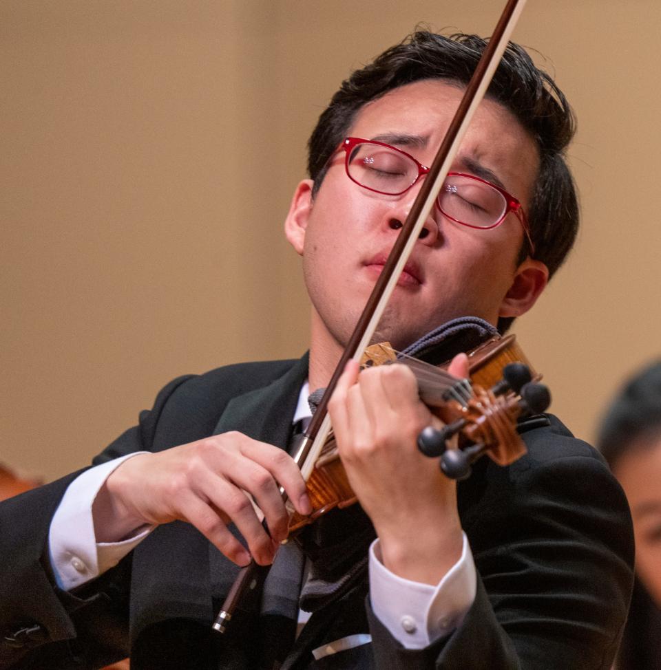 Julian Rhee performs Wednesday, Sept. 21, 2022, at Butler University for the classical finals for the International Violin Competition of Indianapolis. The competition takes place every four years, and is open to young violinists. The East Coast Chamber Orchestra accompanied the musicians during selected Mozart and Kreisler pieces.