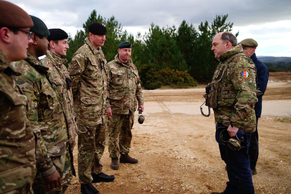 Defence secretary Ben Wallace meeting the crew of an Ajax Ares armored personnel carrier during a visit to Bovington Camp in Dorset (Getty Images)
