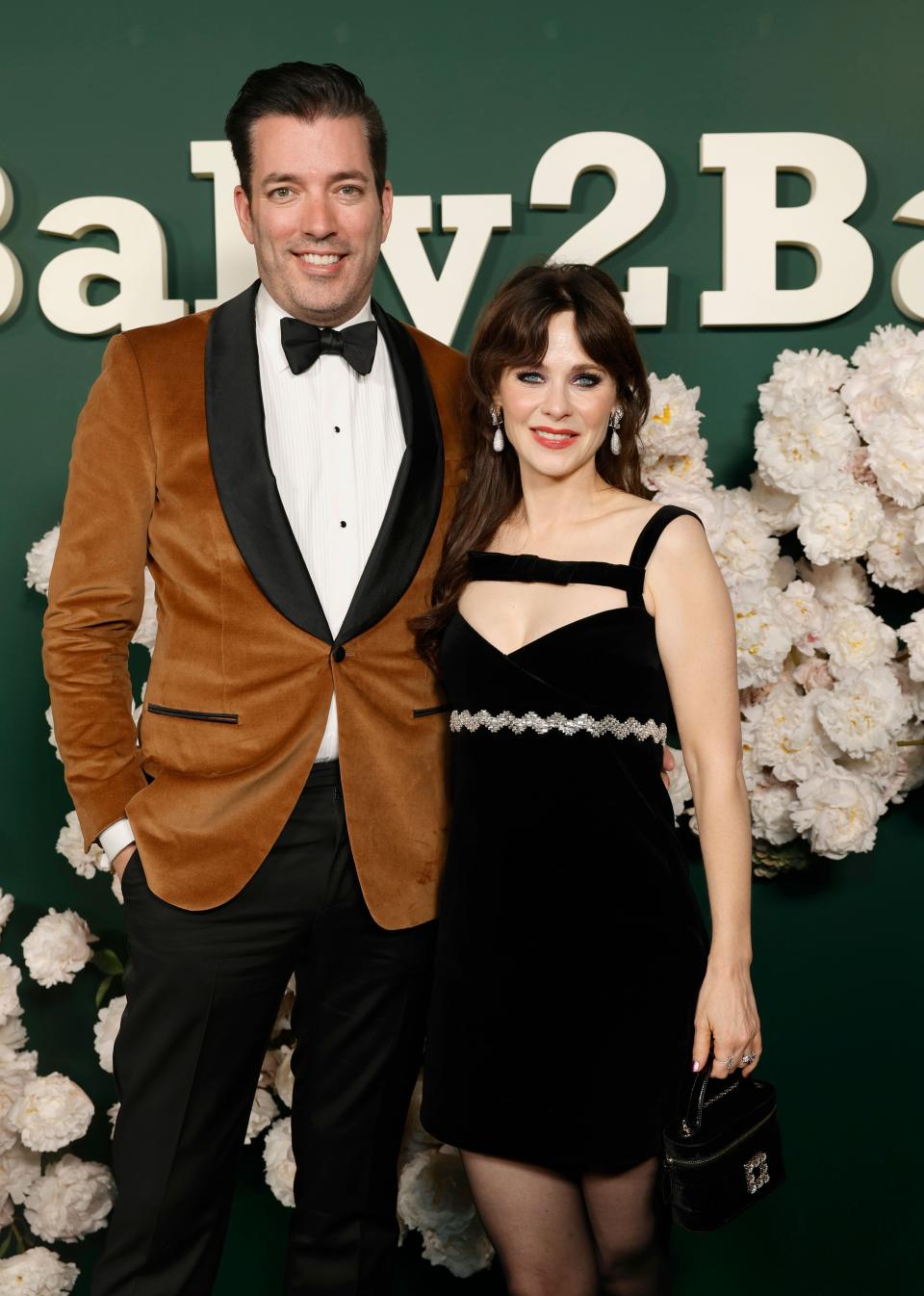 WEST HOLLYWOOD, CALIFORNIA - NOVEMBER 11: (L-R) Jonathan Scott and Zooey Deschanel attend 2023 Baby2Baby Gala Presented By Paul Mitchell at Pacific Design Center on November 11, 2023 in West Hollywood, California. (Photo by Stefanie Keenan/Getty Images for Baby2Baby)