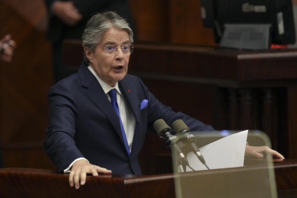 Ecuadorean President Guillermo Lasso speaks during during a National Assembly session where opposition lawmakers seek to try him for embezzlement accusations in Quito, Ecuador, Tuesday, May 16, 2023. (AP Photo/Dolores Ochoa)