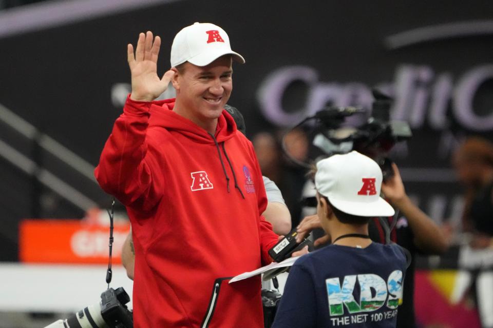 Peyton Manning and son Marshall Manning during Pro Bowl Games.