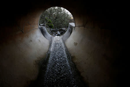 Rainwater flows down off Cape Town's iconic Table Mountain, South Africa, September 9, 2017. Despite some winter rainfall dams are running dangerously low following the worst drought in a century in the region. The city has imposed severe water restrictions in an attempt to avert a major water crisis. REUTERS/Mike Hutchings