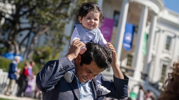 PHOTO: FILE - Rep. Jimmy Gomez and his son Hodge, 7 months, are seen on the South Lawn during the White House Easter Egg Roll, April 10, 2023. (Tom Williams/CQ-Roll Call, Inc via Getty Images, FILE)