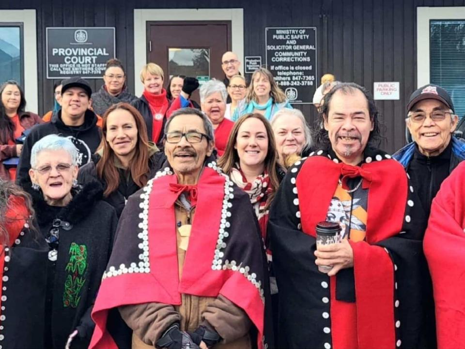 Members of the Gitxsan Nation community are pictured after the conclusion of a court case that ruled a Gitxsan girl should be permanently in the care of her auntie, who lives in Hazelton, B.C. (Kirsten Barnes - image credit)
