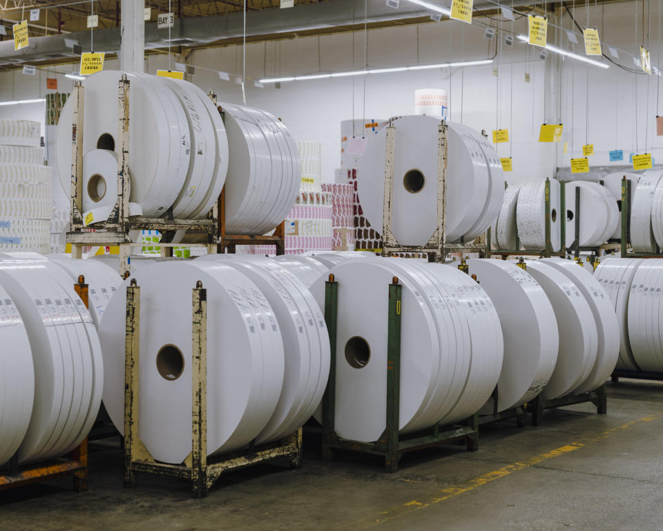 Unprinted rolls of paper in Dart's manufacturing facility in Chicago on Oct. 23, 2019. The Dart Container Corporation, which makes foam products, is a manufacturing behemoth and produced a fortune for the family behind it but environmentalists say its products are polluting the globe. (Lyndon French/The New York Times)