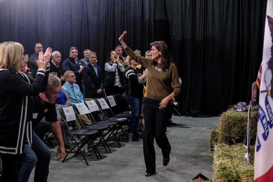 Former U.N. Ambassador Nikki Haley waves to audience members during U.S. Rep. Mariannette Miller-Meeks', R-Iowa, Triple MMM Tailgate event in Iowa City, Iowa on Friday, Oct. 20, 2023. The event featured remarks from several candidates for the Republican Party's nomination for President. (Nick Rohlman/The Gazette via AP)