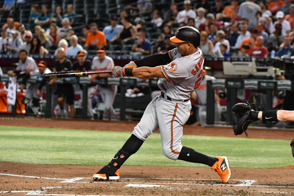 Jul 24, 2019; Phoenix, AZ, USA; Baltimore Orioles right fielder Anthony Santander (25) hits a solo home run in the fourth inningagainst the Arizona Diamondbacks at Chase Field. Mandatory Credit: Matt Kartozian-USA TODAY Sports