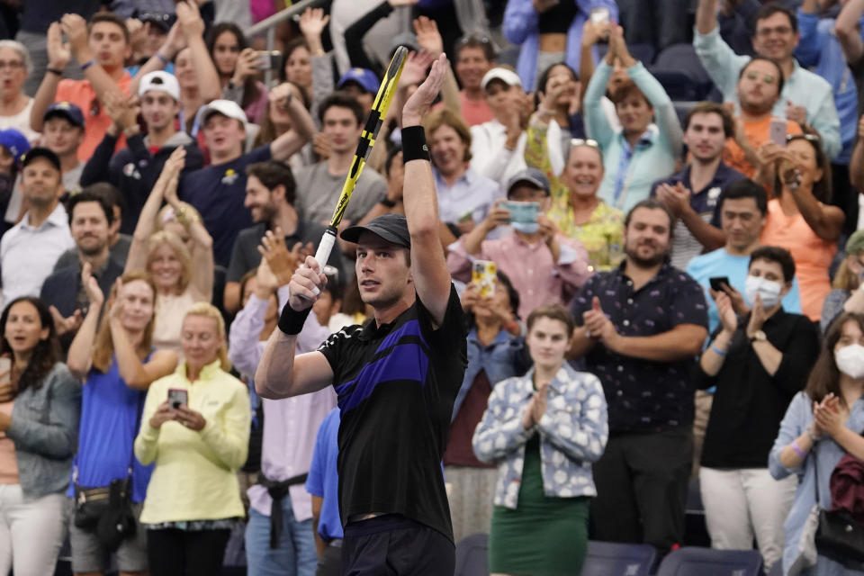 Botic Van de Zandschulp, of the Netherlands, reacts after defeating Diego Schwartzman, of Argentina, during the fourth round of the US Open tennis championships, Sunday, Sept. 5, 2021, in New York. (AP Photo/John Minchillo)