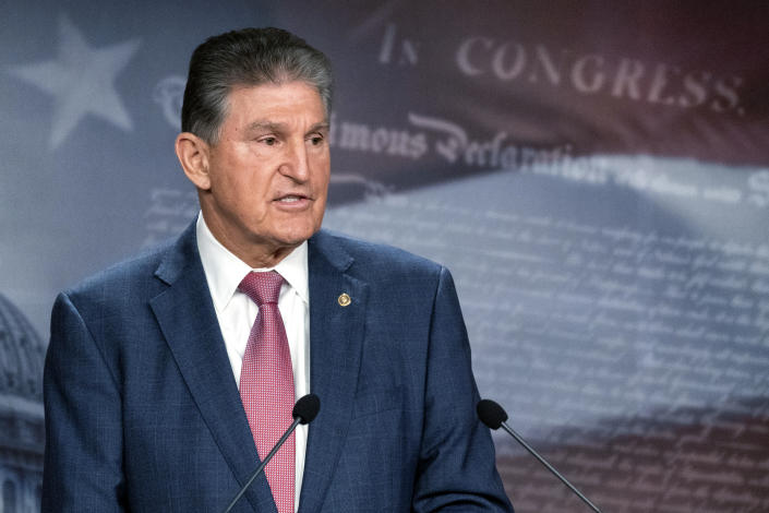 Sen. Joe Manchin, D-W.Va., speaks with reporters during a news conference on Capitol Hill on Monday.