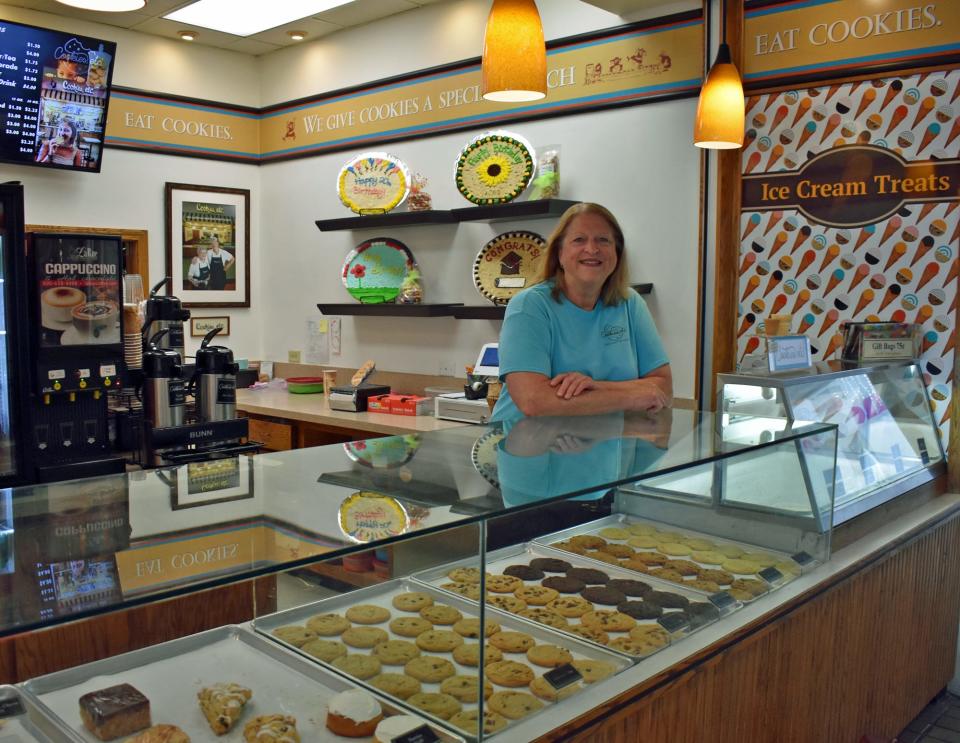 Owner Mary Jo Banwart poses at her Cookies, etc. counter at North Grand Mall in Ames. She started the business in 1983 using her mom's cookie recipes.