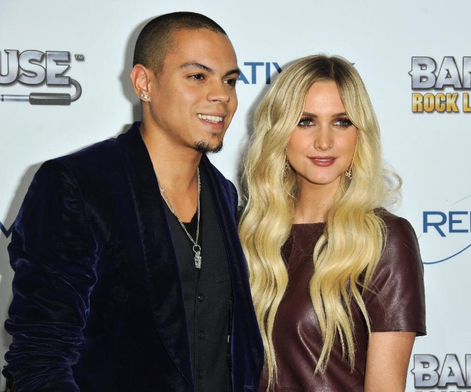 FILE - This Nov. 12, 2013 file photo shows Evan Ross, left, and Ashlee Simpson at the "Bandfuse: Rock Legends" video game launch in Los Angeles. Simpson is engaged to boyfriend Evan Ross, who is the son of Diana Ross. The pair announced the news on Twitter Monday, Jan. 13, 2014, confirmed Simpson’s publicist Janet Ringwood. Simpson was previously married to Fall Out Boy bassist Pete Wentz. They have a five-year-old son named Bronx. Ross is an actor who will appear in the final two installments of “The Hunger Games.” (Photo by Richard Shotwell/Invision/AP, File)