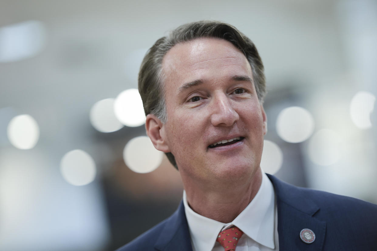 FILE: Virginia Governor Glenn Youngkin answers questions from members of the media after touring an H Mart supermarket while meeting with Asian community leaders on April 06, 2023 in Fairfax, Virginia.  / Credit: Win McNamee / Getty Images