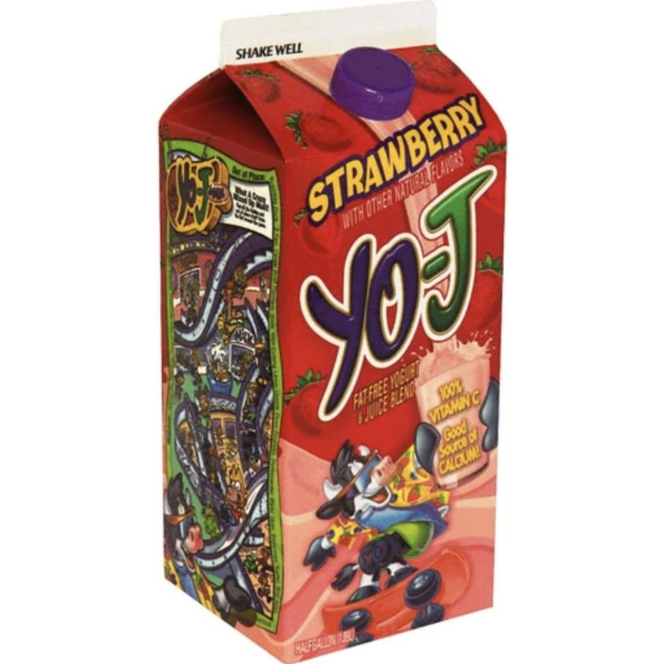 A carton of strawberry Yo-J features a skateboarding cow holding a glass of the drink against a red background