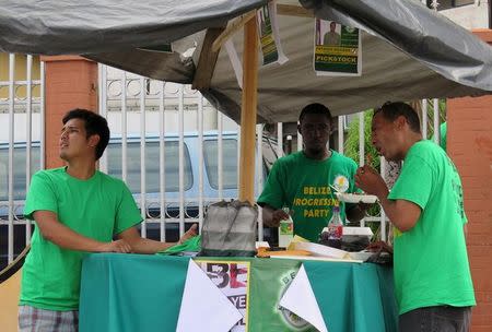 Volunteers with the upstart Belize Progressive Party (BPP) gather near a polling station in downtown Belize City, November 4, 2015. REUTERS/David Alire