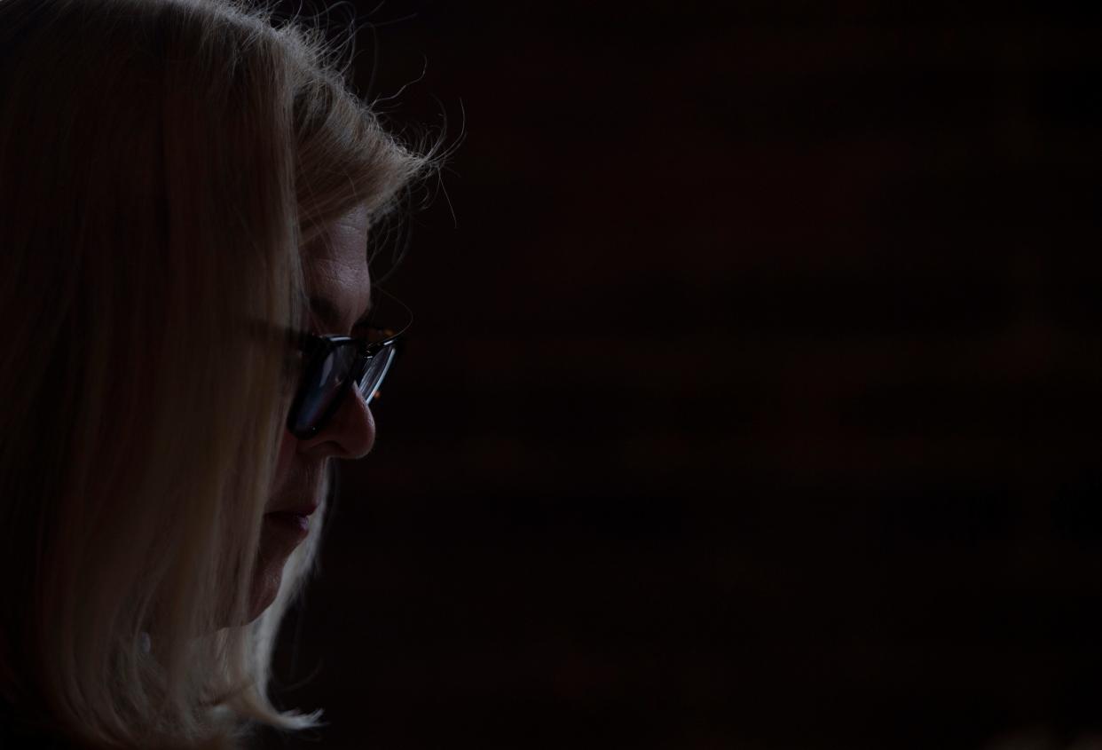 Kellie Reifenberger, teacher at Covenant School, works on her lesson plan before her day begins at her home in Nashville, Tenn., Wednesday, March 6, 2024. Reifenberger, has been working at Brentwood Hills Church of Christ with the rest of the faculty since last years school shooting.