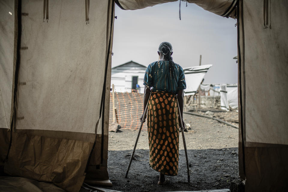 The 42-year-old mother of four who was raped in the Bulengo displacement camp where she had fled war in eastern Congo poses for a photograph Aug. 23, 2023. Hundreds of thousands of women and girls have been displaced over the past year in eastern Congo amid fighting by more than 130 armed groups. That leaves them vulnerable to sexual assault, which is on the rise. French aid group Doctors Without Borders says more than twice as many women in recent months have sought treatment for sexual assault in some displacement camps outside the eastern city of Goma. (AP Photo/Moses Sawasawa)