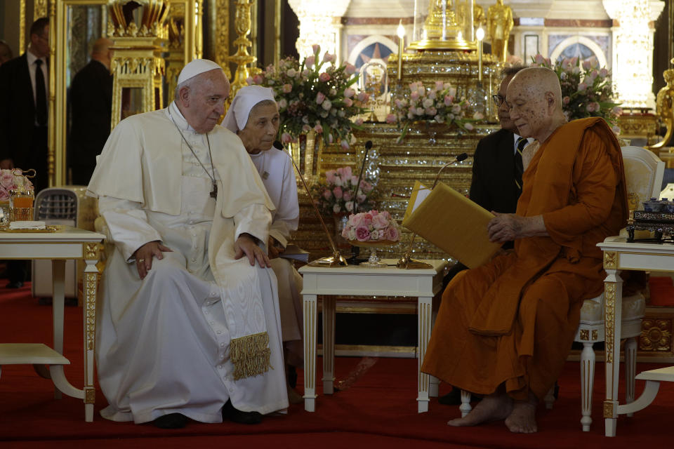 Pope Francis, left, and his cousin, Sister Ana Rosa Sivori visit the Supreme Buddhist Patriarch at Was Ratchabophit Sathit Maha Simaram Temple, Thursday, Nov. 21, 2019, in Bangkok, Thailand. (AP Photo/Gregorio Borgia)