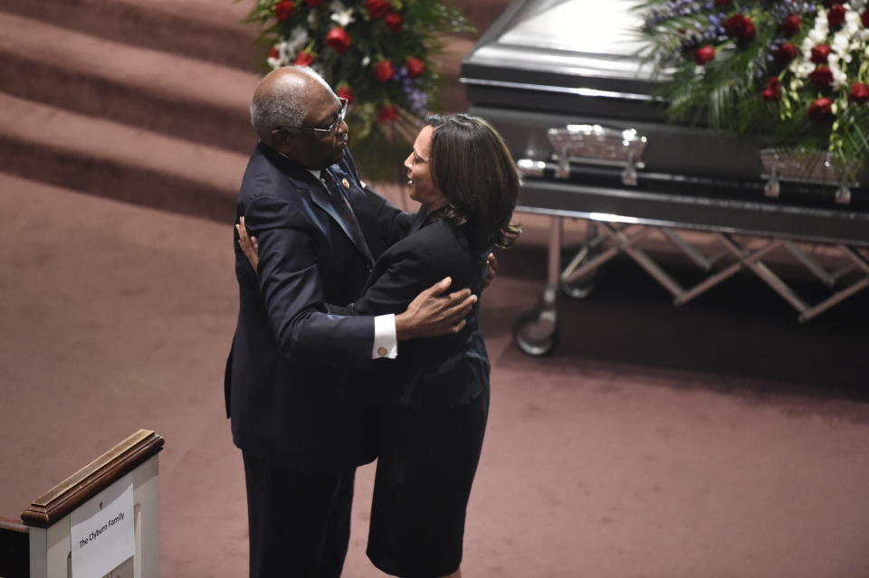 Democratic presidential contender Kamala Harris greets House Majority Whip Jim Clyburn at the funeral of his wife Emily on Sunday, Sept. 22, 2019, in West Columbia, S.C. (AP Photo/Meg Kinnard)